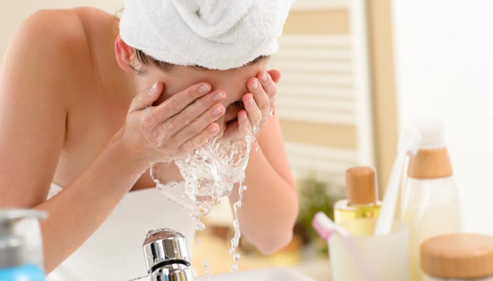 washing face too much causes acne